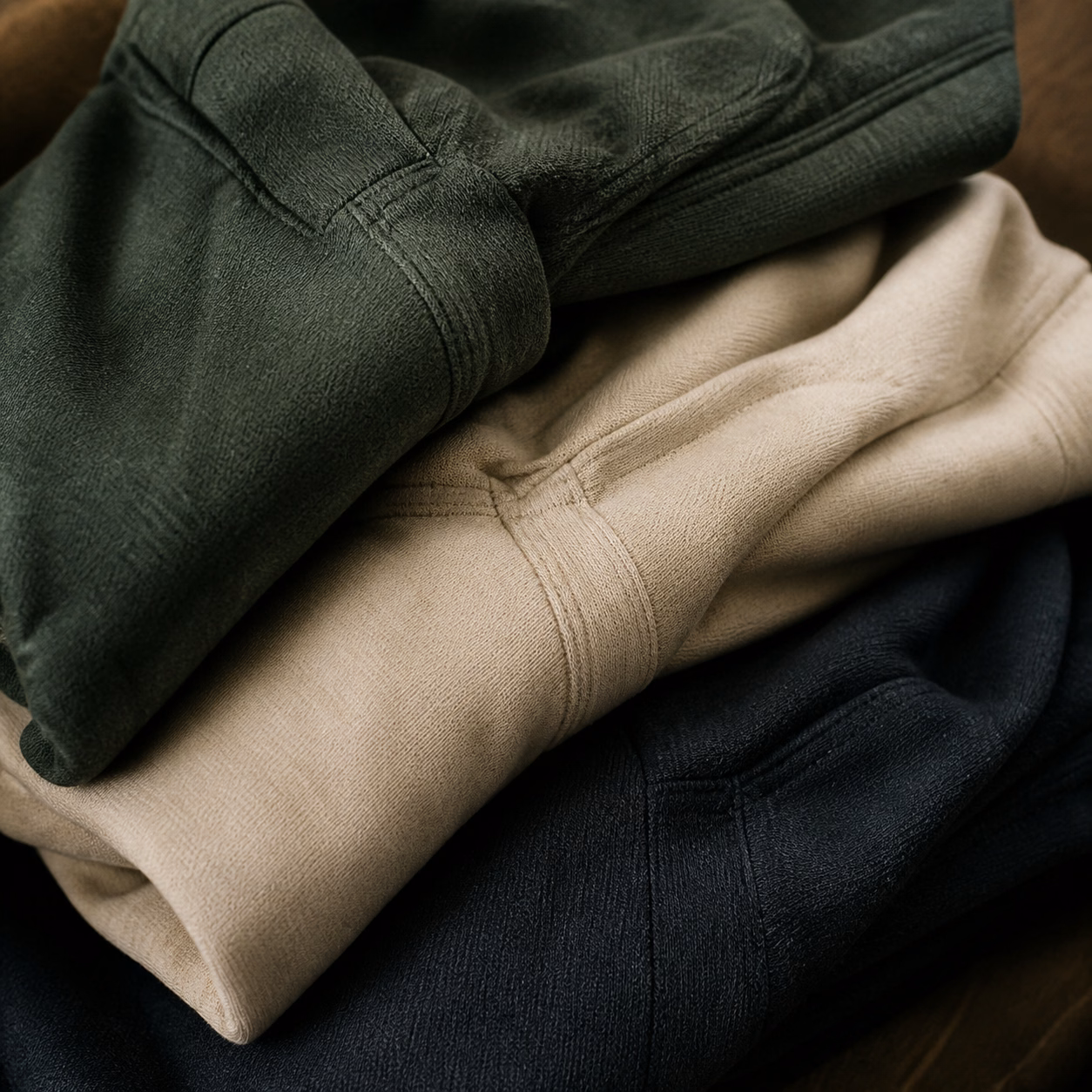 Folded green and natural garments